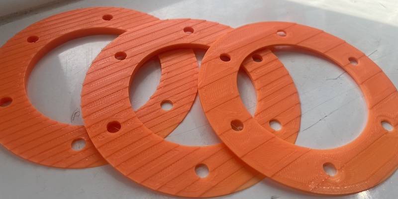 Fuel filler neck wedge shims